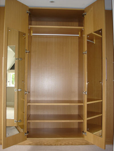 Oak fitted wardrobe showing interior