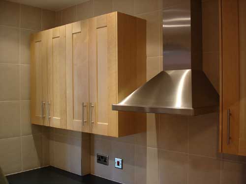 Contemporary kitchen with black laminate worktops #3