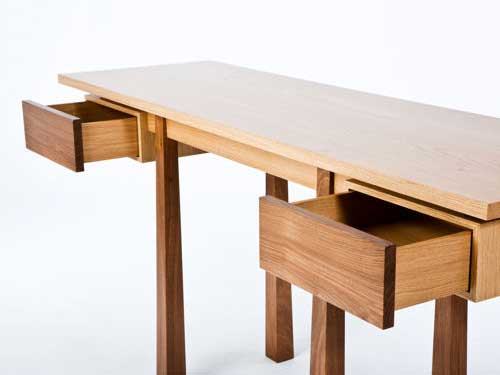 Oak and Walnut table showing drawers open